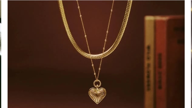 Necklaces and pendants laid on books