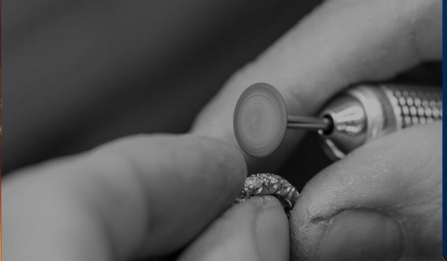 Hands crafting a piece of jewellery
